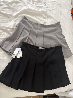 bp Two-Pack Pleated Skirts in Black and Light Gray